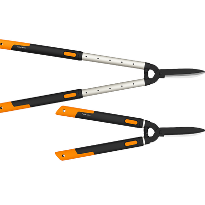 Fiskars HS86 Teleskopik Çit Makası 68-93 cm - ürünün ambalaj ve kullanım görünümü 2